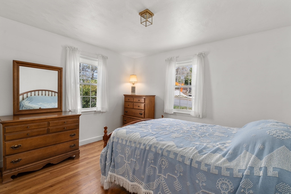62 Felch Road Natick, MA 01760 - Photo 10 of 27 a bedroom with a bed and a window