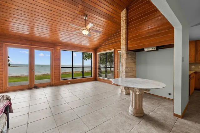 a view of a porch with furniture