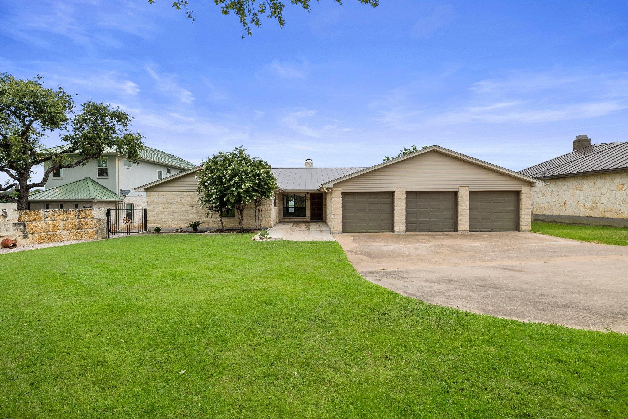 209 Senisa Drive Buchanan Dam, TX 78609 - Photo 2 of 30 front view of a house with a yard