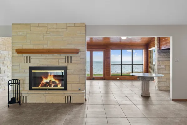 a large room with windows and view of balcony