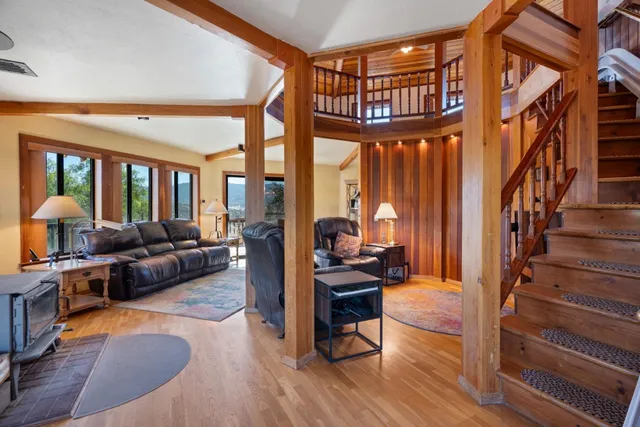 a bathroom with a shower and a glass door