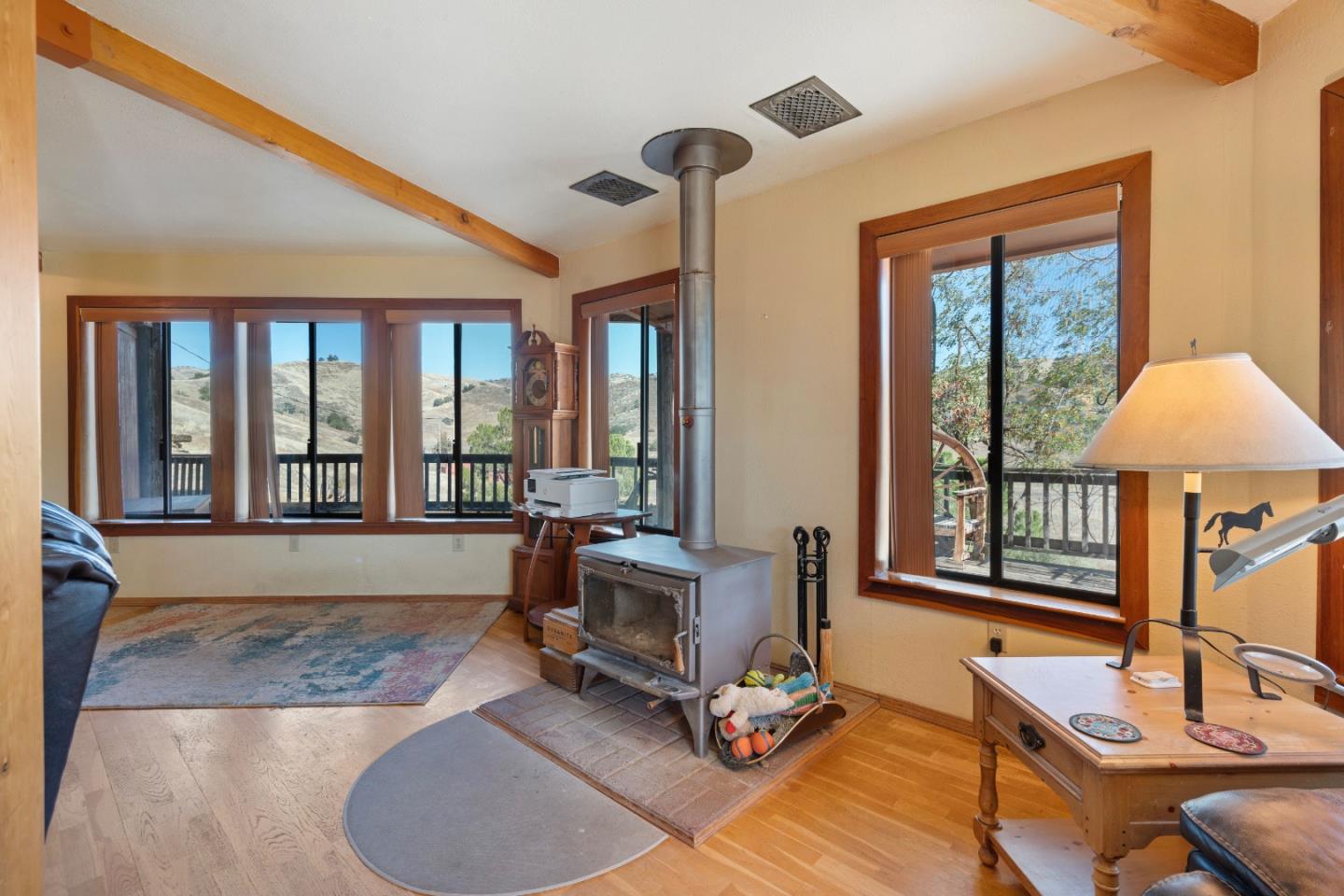 20101 Panoche Road Paicines, CA 95043 - Photo 17 of 97 a living room with furniture and a window