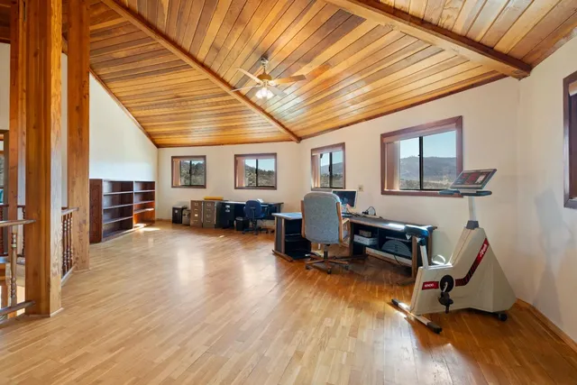 a view of balcony with chairs