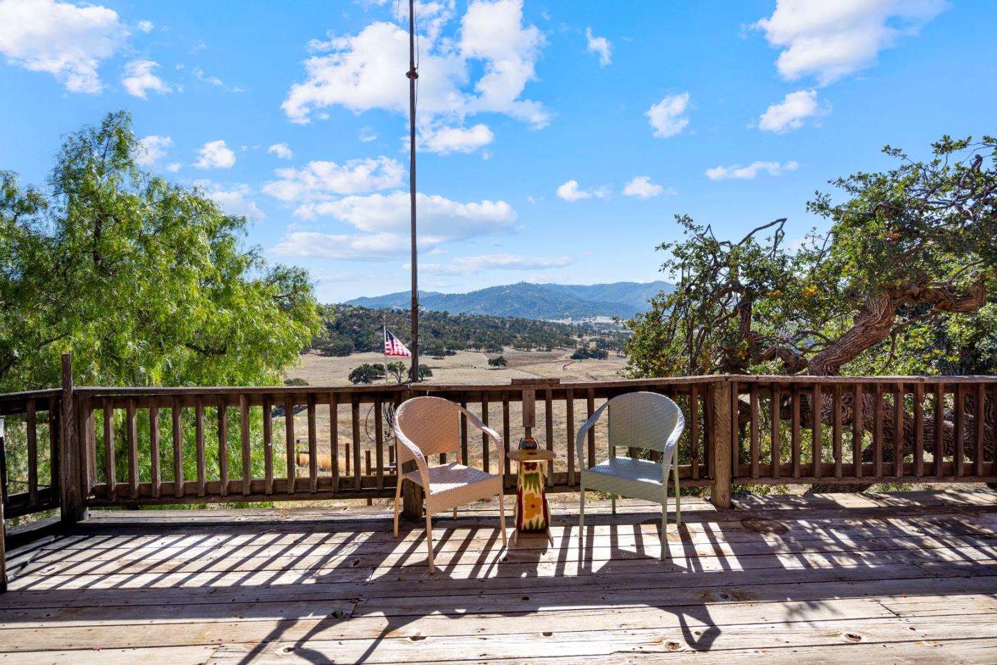 20101 Panoche Road Paicines, CA 95043 - Photo 42 of 97 a view of a balcony with wooden floor and outdoor space