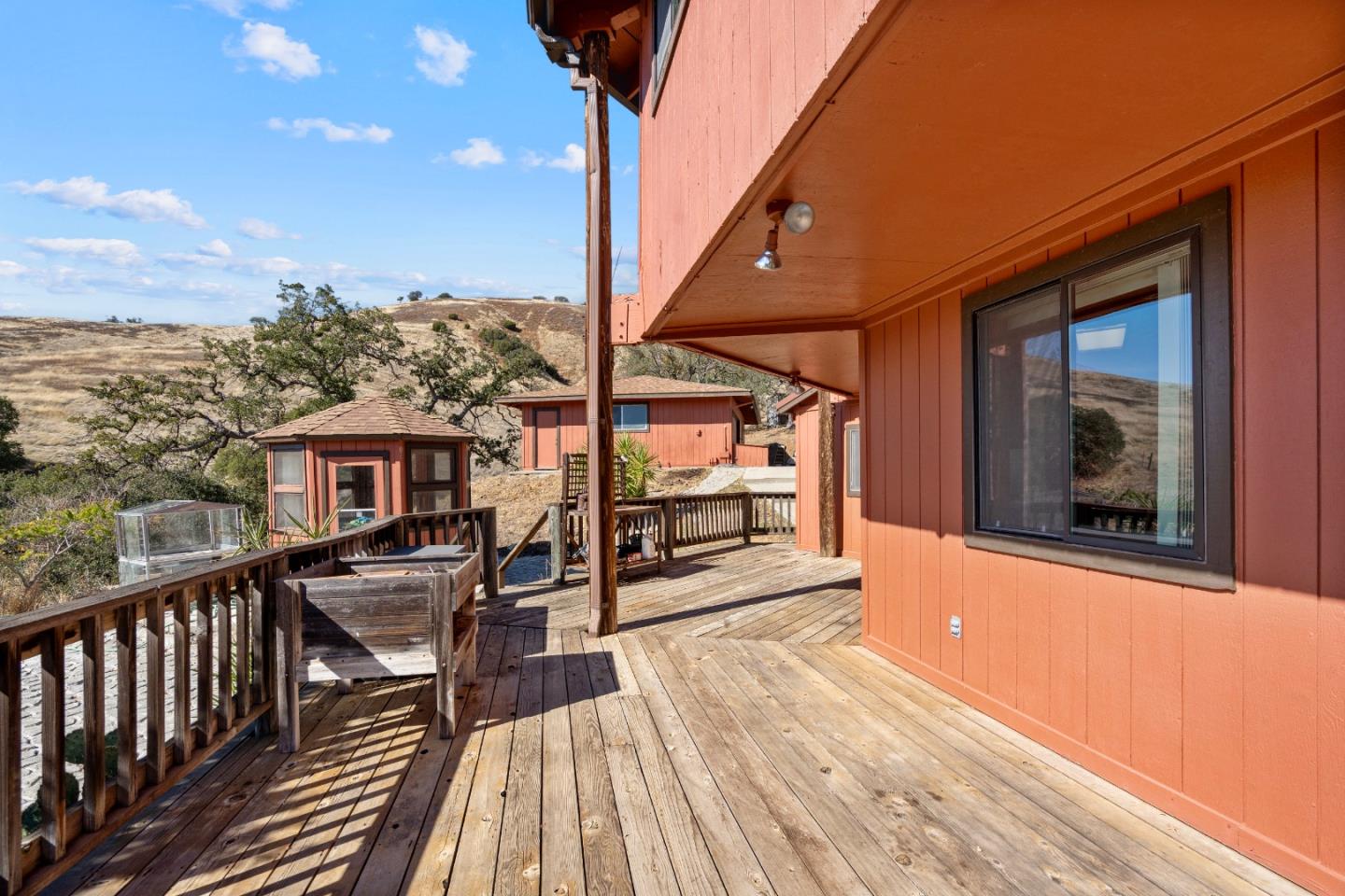 20101 Panoche Road Paicines, CA 95043 - Photo 43 of 97 a view of a balcony with chairs and wooden floor