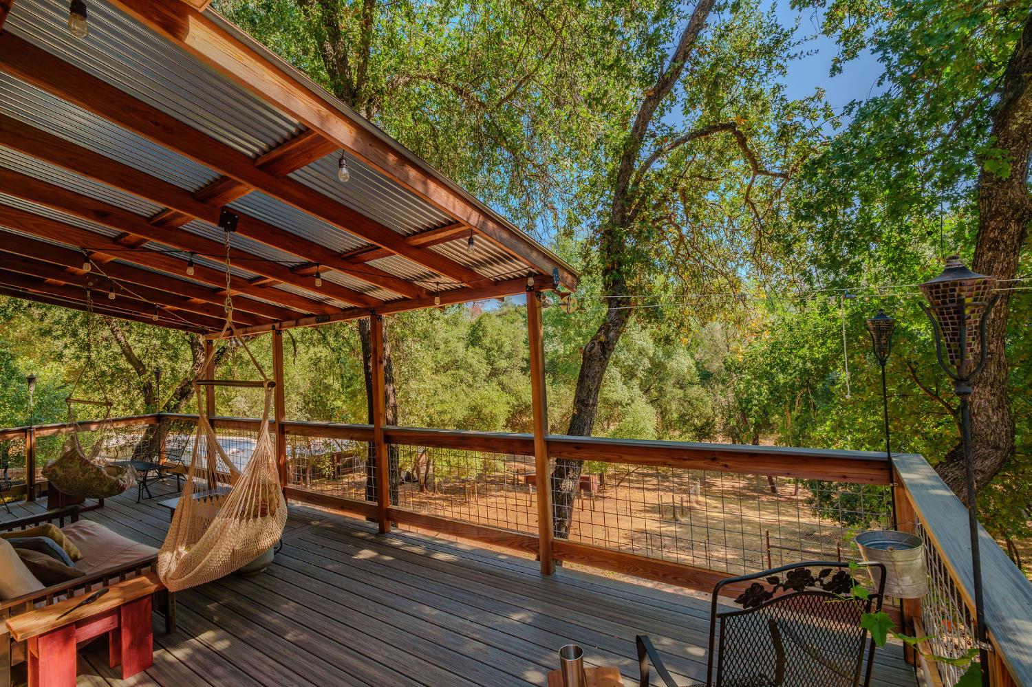 2988 Spring Hill Road San Andreas, CA 95249 - Photo 10 of 95 a view of balcony with wooden floor and outdoor seating