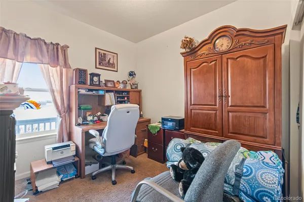 a view of a livingroom with furniture and a couch