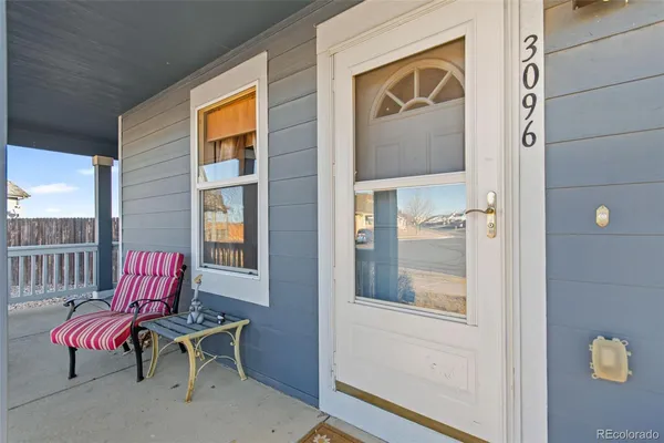 a view of a house with a lounge chair