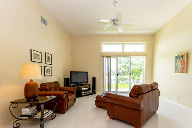 19627 Dinner Key Drive Boca Raton, FL 33498 - Photo 13 of 46 a living room with furniture and a window