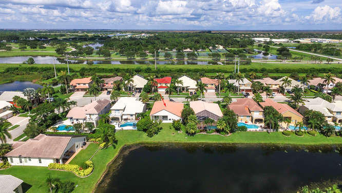 19627 Dinner Key Drive Boca Raton, FL 33498 - Photo 29 of 46 an aerial view of a houses with outdoor space and lake view