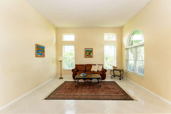 19627 Dinner Key Drive Boca Raton, FL 33498 - Photo 5 of 46 a living room with furniture and a table