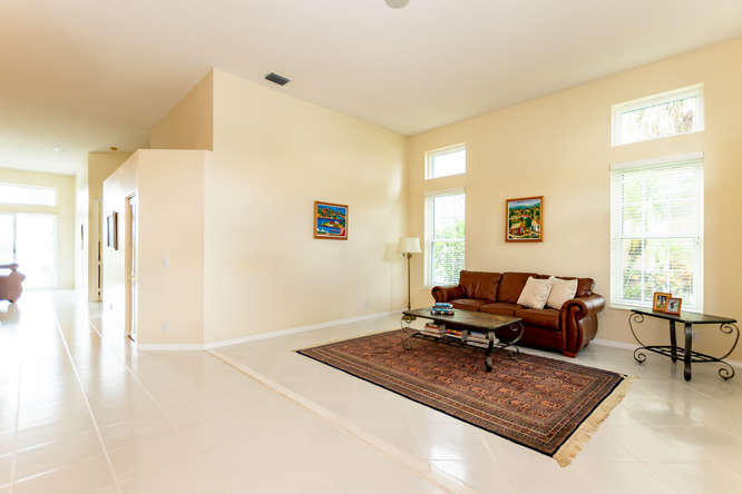19627 Dinner Key Drive Boca Raton, FL 33498 - Photo 6 of 46 a living room with furniture rug and window