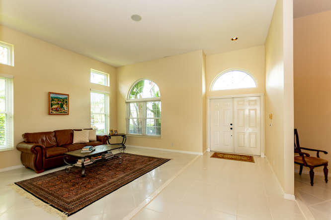 19627 Dinner Key Drive Boca Raton, FL 33498 - Photo 7 of 46 a living room with furniture and a window