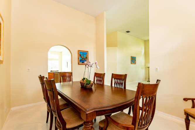 19627 Dinner Key Drive Boca Raton, FL 33498 - Photo 9 of 46 a view of a dining room with furniture and window