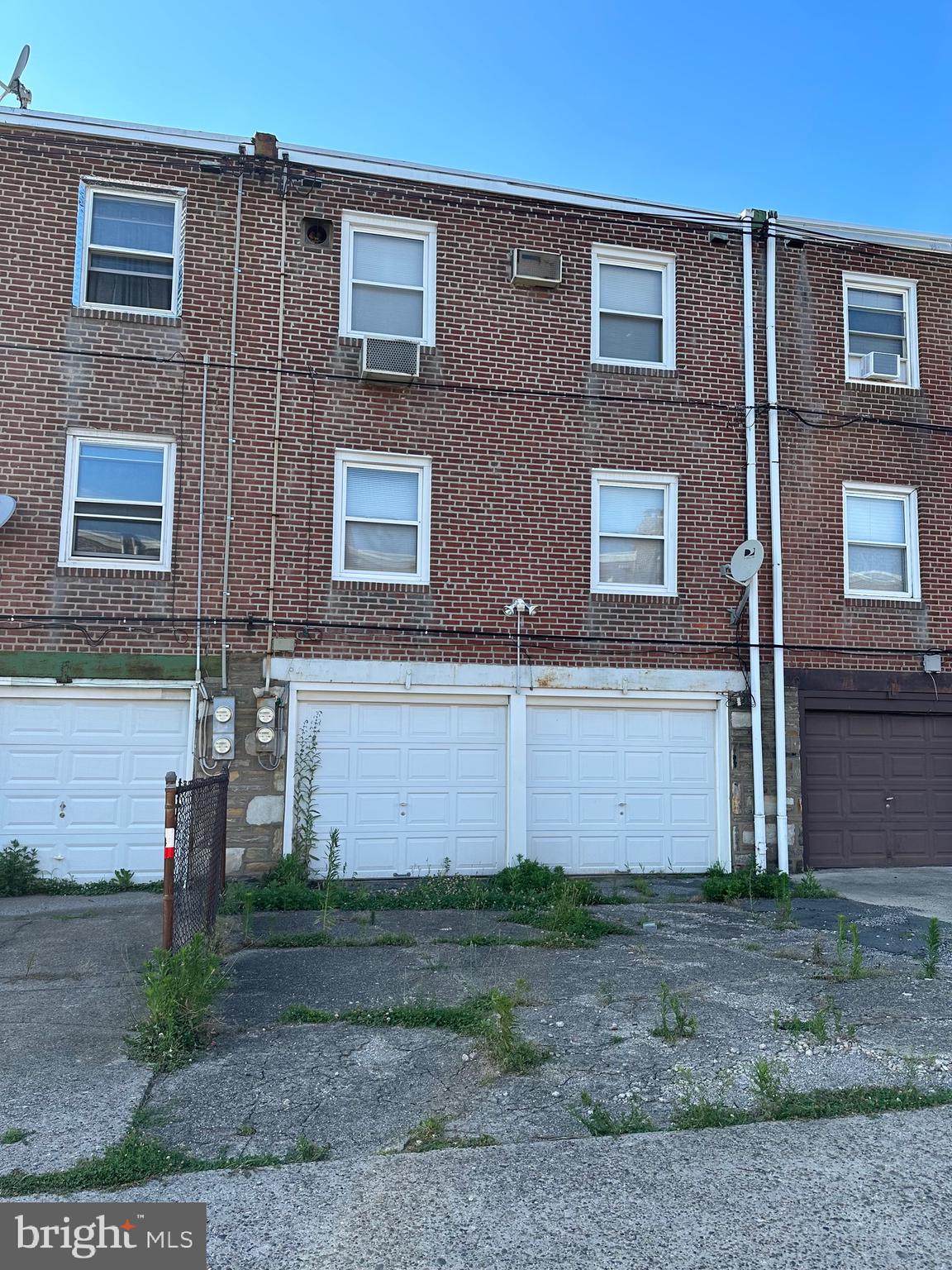 7215 Erdrick Street Philadelphia, PA 19135 - Photo 7 of 12 a front view of a house with garden
