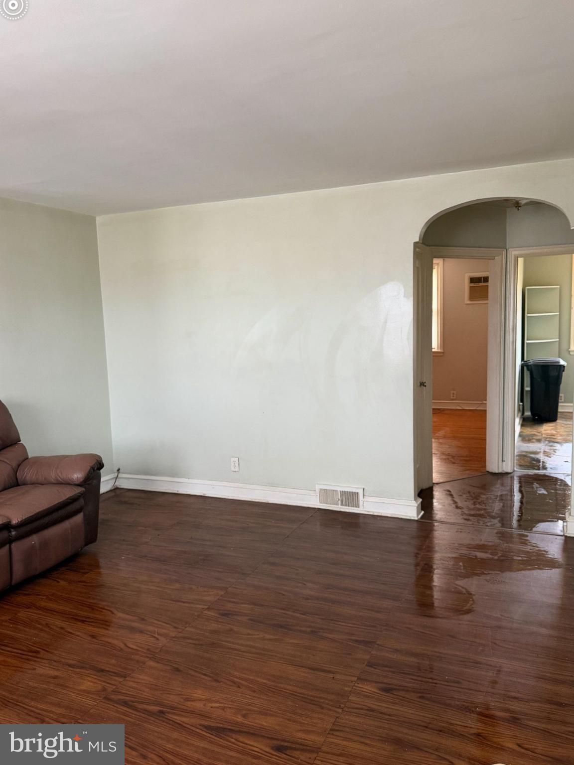 7215 Erdrick Street Philadelphia, PA 19135 - Photo 8 of 12 a view of livingroom with wooden floor