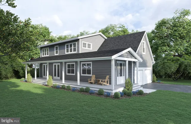 a view of a house with a yard and plants