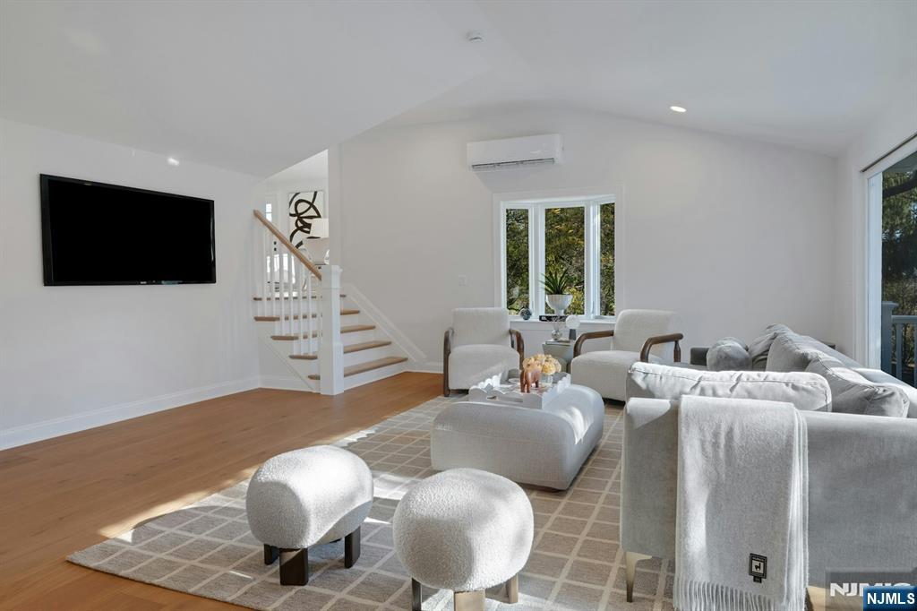 30 Edgecliff Road Montclair, NJ 07043 - Photo 12 of 46 a living room with furniture and a flat screen tv