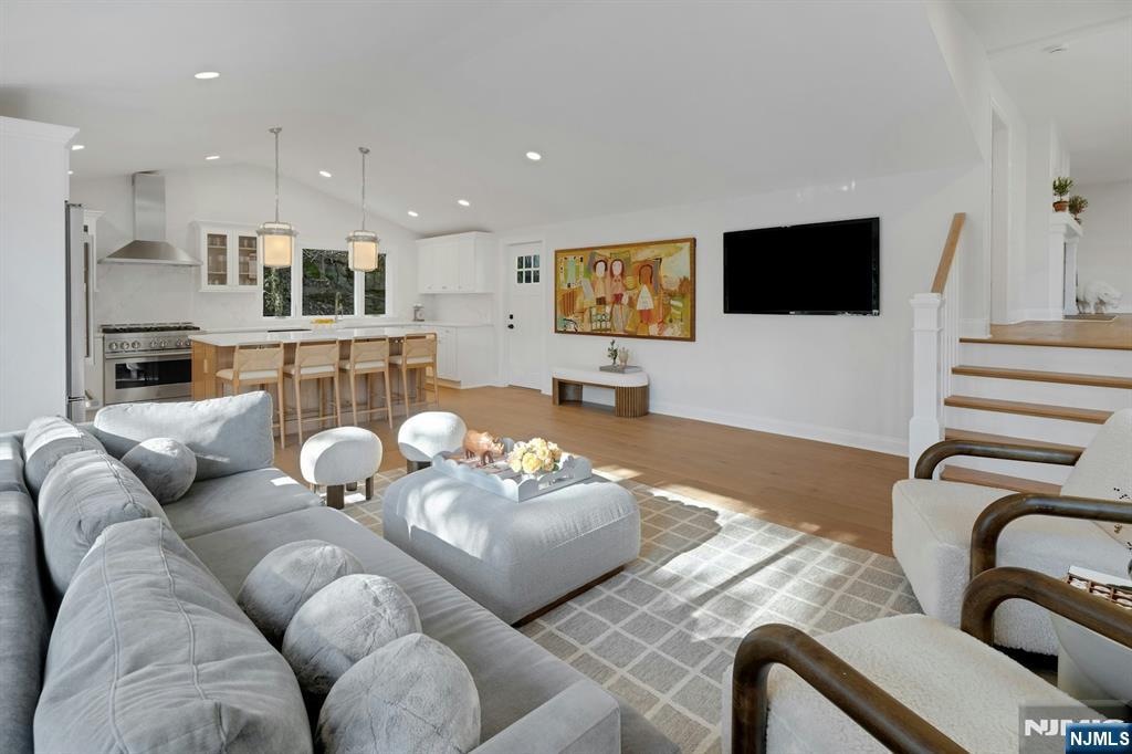 30 Edgecliff Road Montclair, NJ 07043 - Photo 18 of 46 a living room with furniture and a flat screen tv