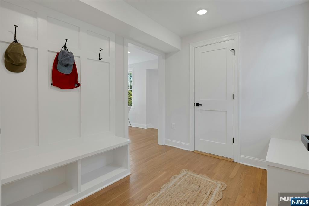 30 Edgecliff Road Montclair, NJ 07043 - Photo 19 of 46 a view of a room with wooden floor and cabinets