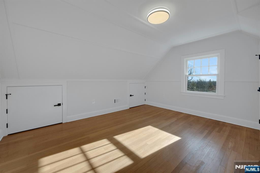 30 Edgecliff Road Montclair, NJ 07043 - Photo 29 of 46 a view of a room with wooden floor and window