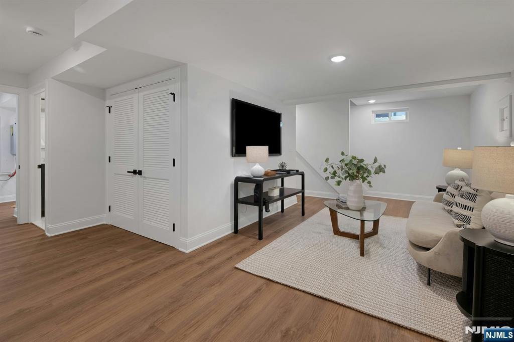 30 Edgecliff Road Montclair, NJ 07043 - Photo 33 of 46 a living room with furniture and a potted plant