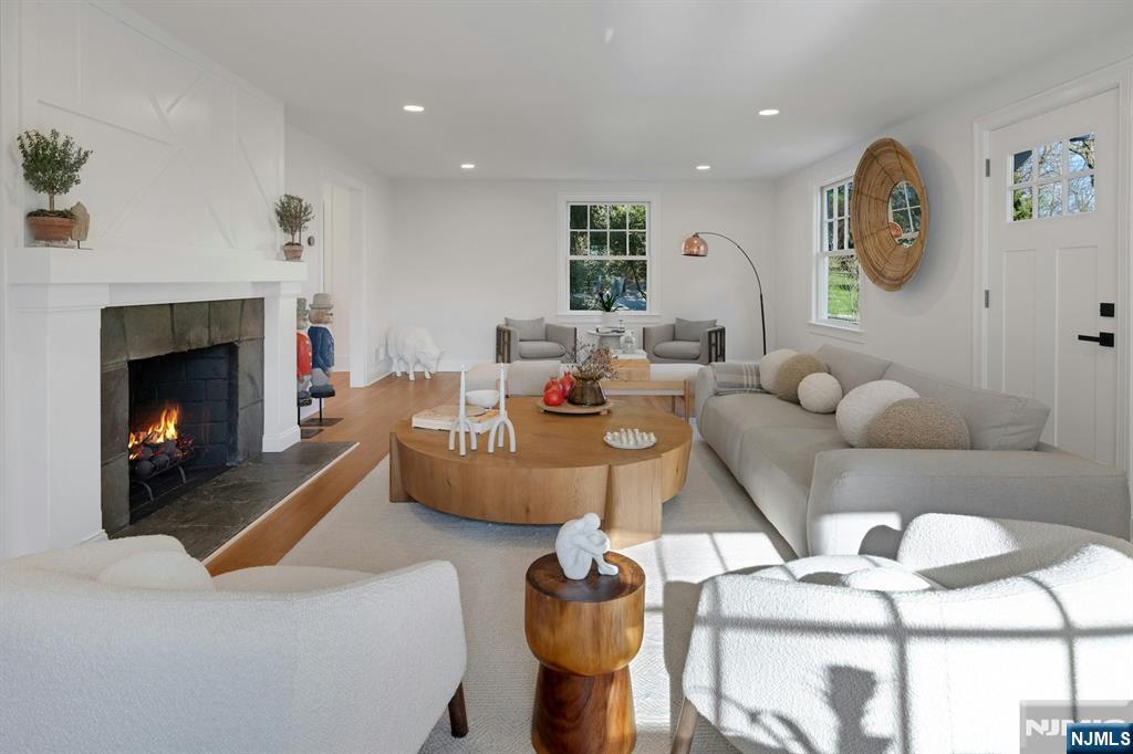 30 Edgecliff Road Montclair, NJ 07043 - Photo 9 of 46 a living room with furniture and a fireplace
