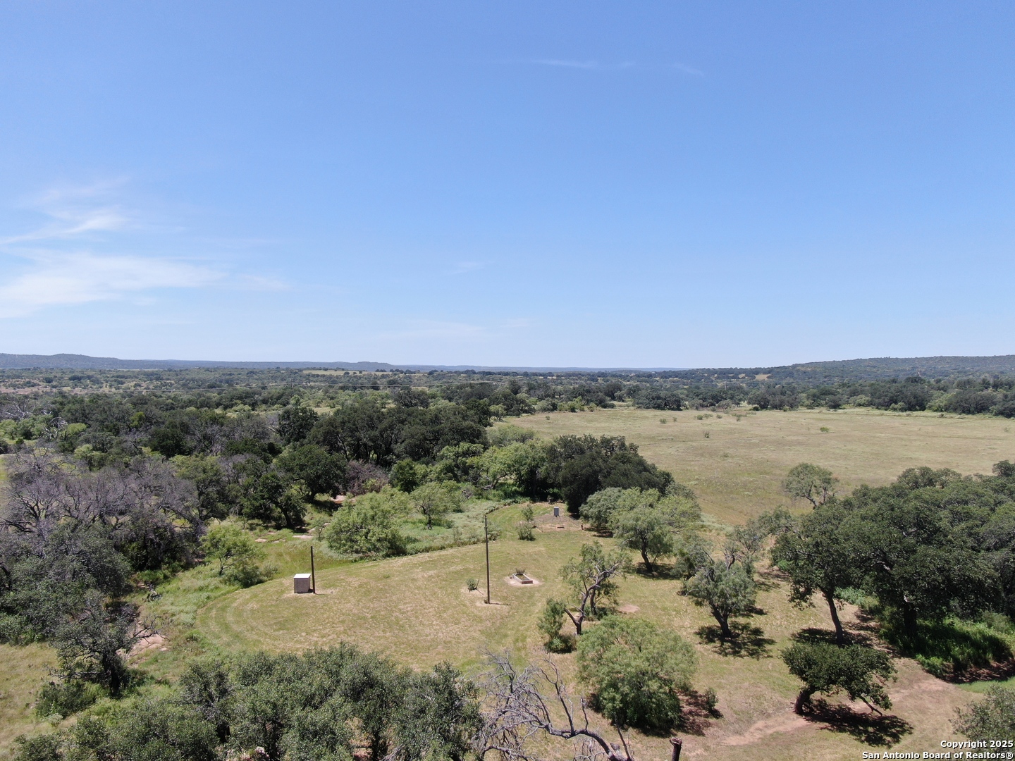 7200 South Us Highw Mason, TX 76856 - Photo 13 of 41 a view of a lake with mountains in the background