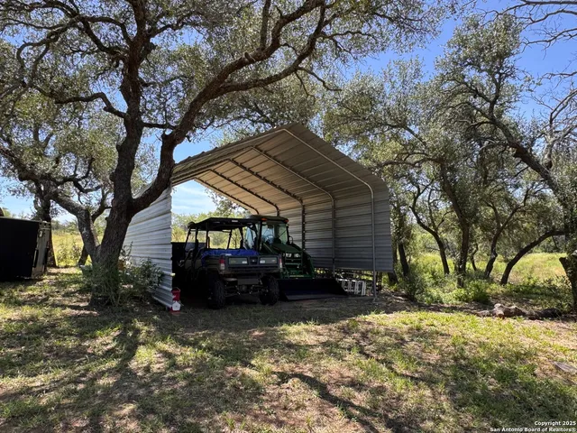 a bed room with a bed and a television