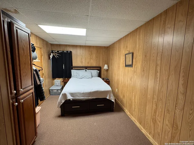 a room with furniture and a large window