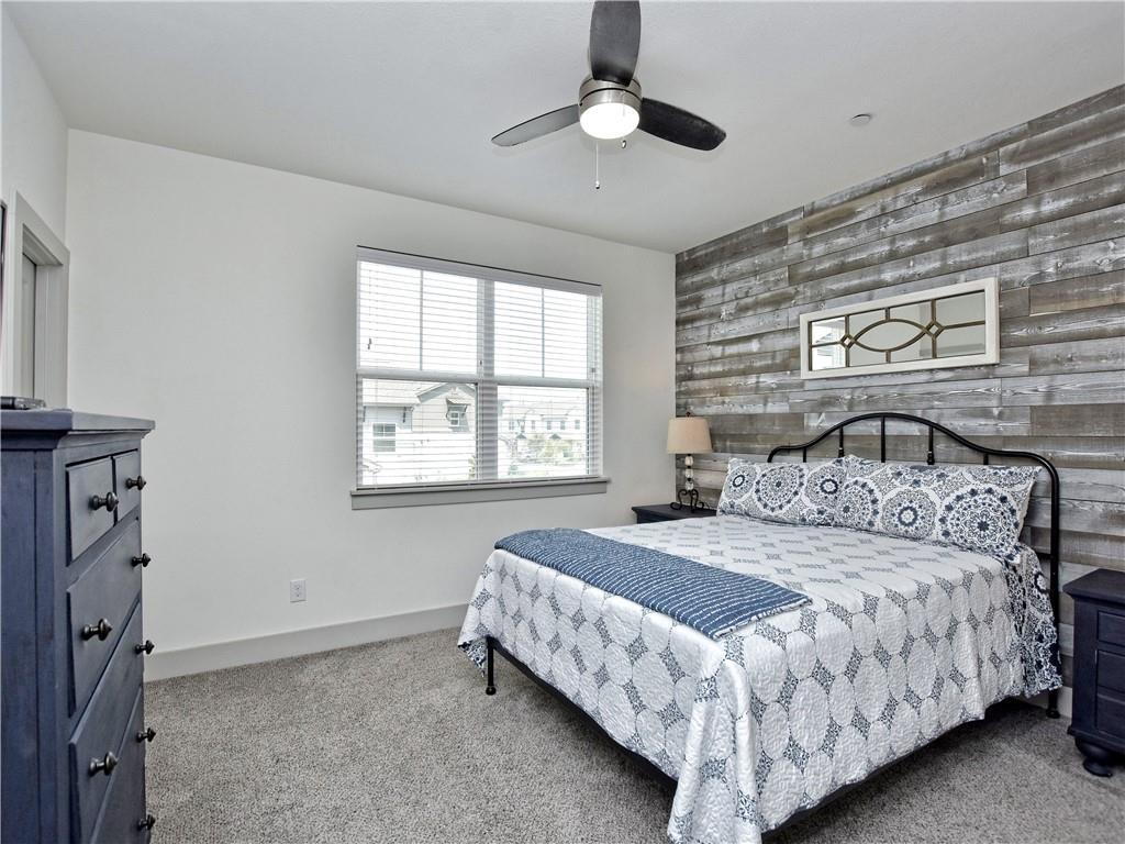 2172 Local Rebel Street Leander, TX 78641 - Photo 11 of 24 a bedroom with a bed and a window