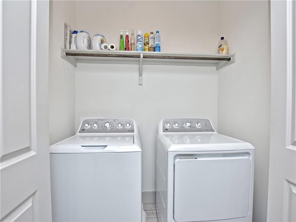 2172 Local Rebel Street Leander, TX 78641 - Photo 18 of 24 a utility room with dryer and washer