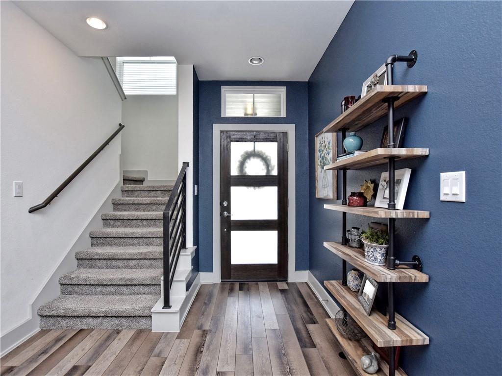 2172 Local Rebel Street Leander, TX 78641 - Photo 2 of 24 a view of entryway and hall with wooden floor