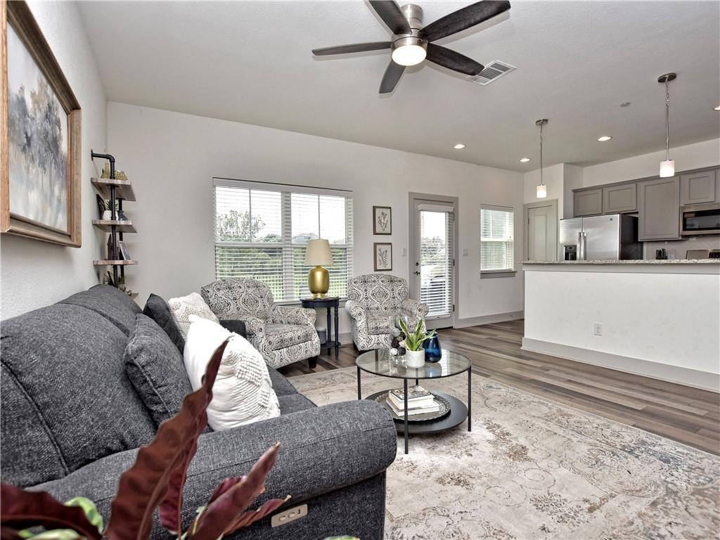 2172 Local Rebel Street Leander, TX 78641 - Photo 3 of 24 a living room with furniture and a large window