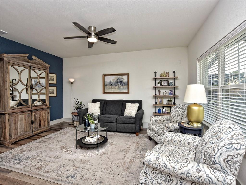 2172 Local Rebel Street Leander, TX 78641 - Photo 5 of 24 a living room with furniture and wooden floor