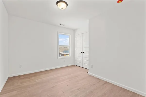 an empty room with windows