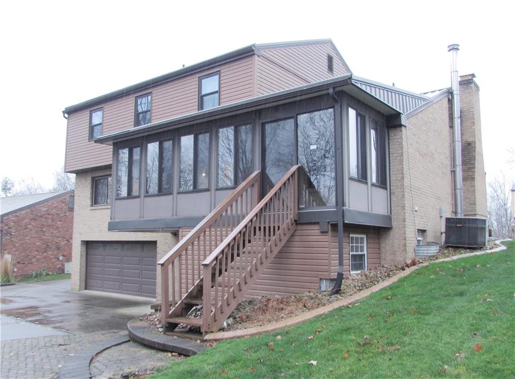 717 Blue Ridge Road Pittsburgh, PA 15239 - Photo 25 of 25 a view of a house with a deck front of house