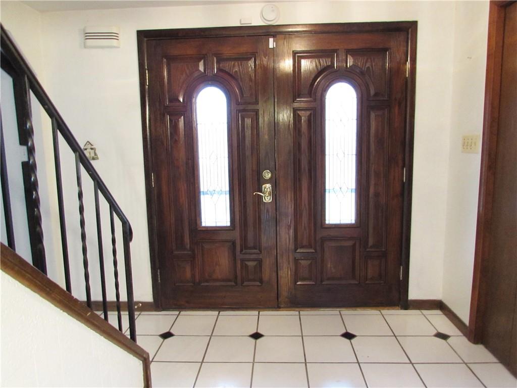 717 Blue Ridge Road Pittsburgh, PA 15239 - Photo 4 of 25 a view of entryway with a front door
