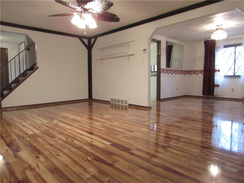 717 Blue Ridge Road Pittsburgh, PA 15239 - Photo 6 of 25 a view of a livingroom with wooden floor