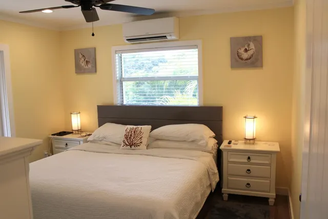 a bathroom with a shower and a sink