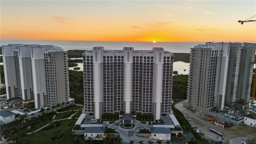 13945 Old Coast Road, Unit 1906 Naples, FL 34110 - Photo 33 of 40 a view of a city with tall buildings