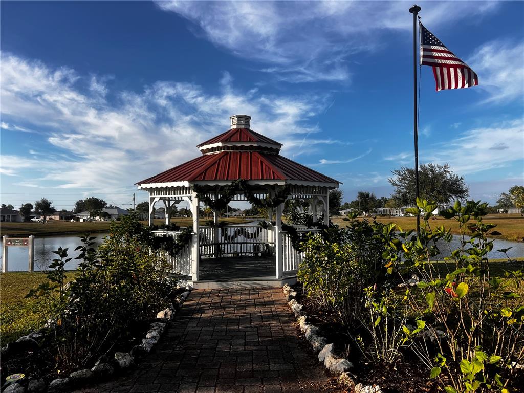 25450 Islas Drive Punta Gorda, FL 33955 - Photo 13 of 21 a view of a house with a yard