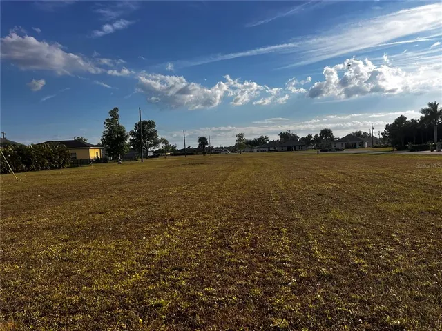 a view of a street with a building in the background