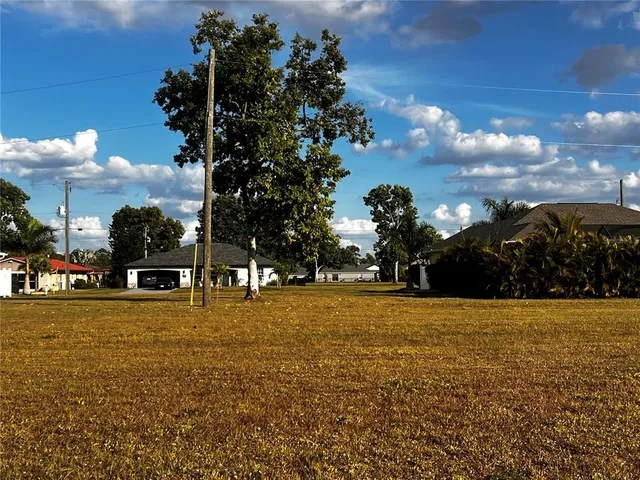 a view of outdoor space with garden and lots of green space