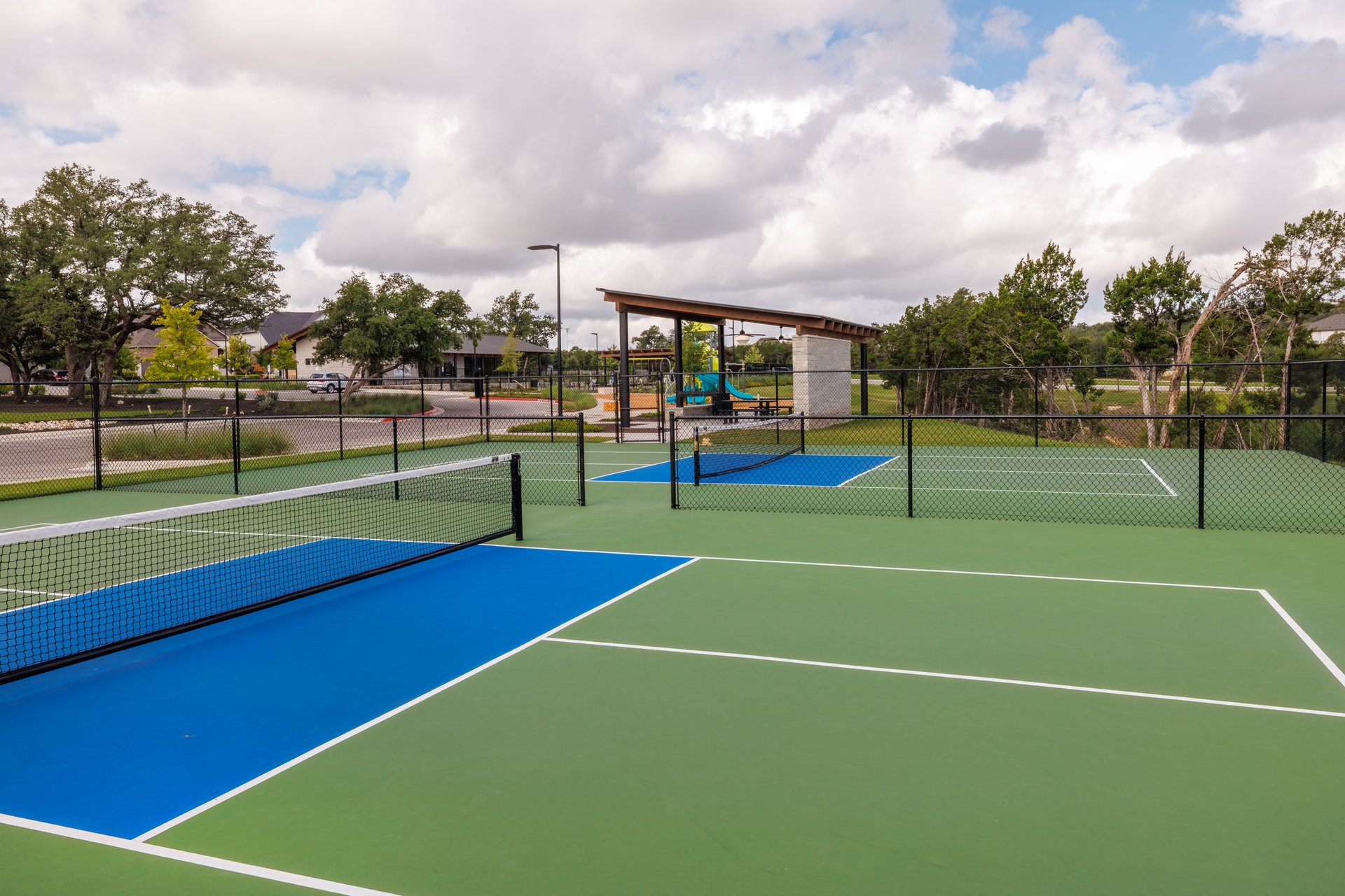 317 Autumn Oak Way Georgetown, TX 78628 - Photo 38 of 40 a view of an outdoor space and tennis court
