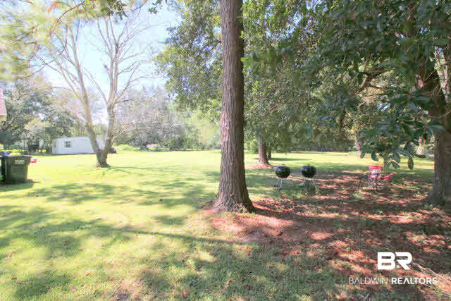 16809 River Park Road Fairhope, AL 36532 - Photo 3 of 18 Room galore and all level for the easiest of care.