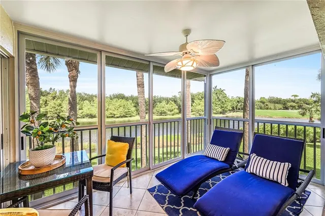 a view of a city from a dining room with furniture window and outside view