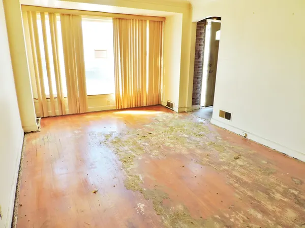 an empty room with windows