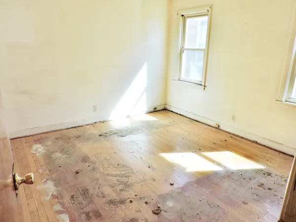 an empty room with windows