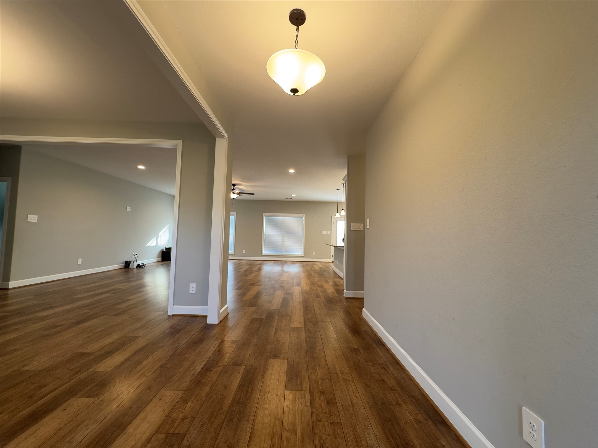 723 Sandy Corner Road El Campo, TX 77437 - Photo 8 of 20 a view of a room with wooden floor